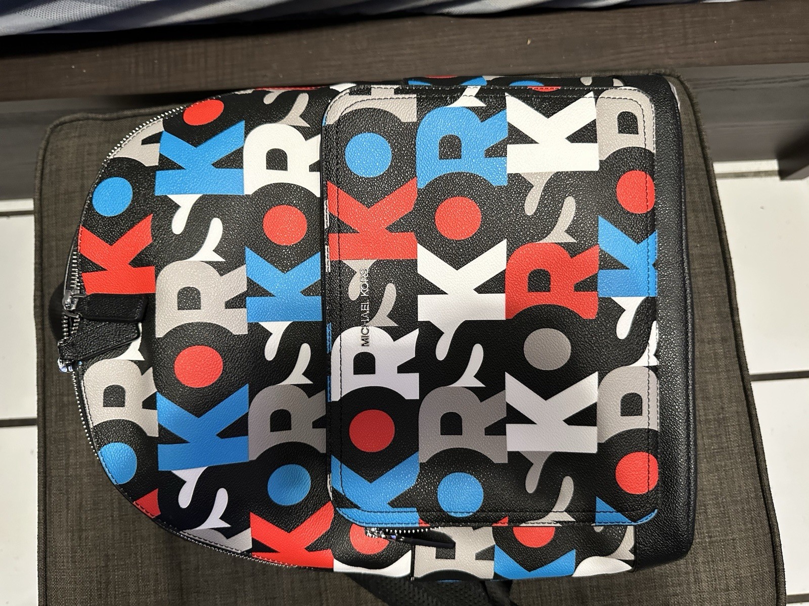 Michael Kors Cooper Signature PVC Graphic Logo Commuter Backpack Red Blue Multi
