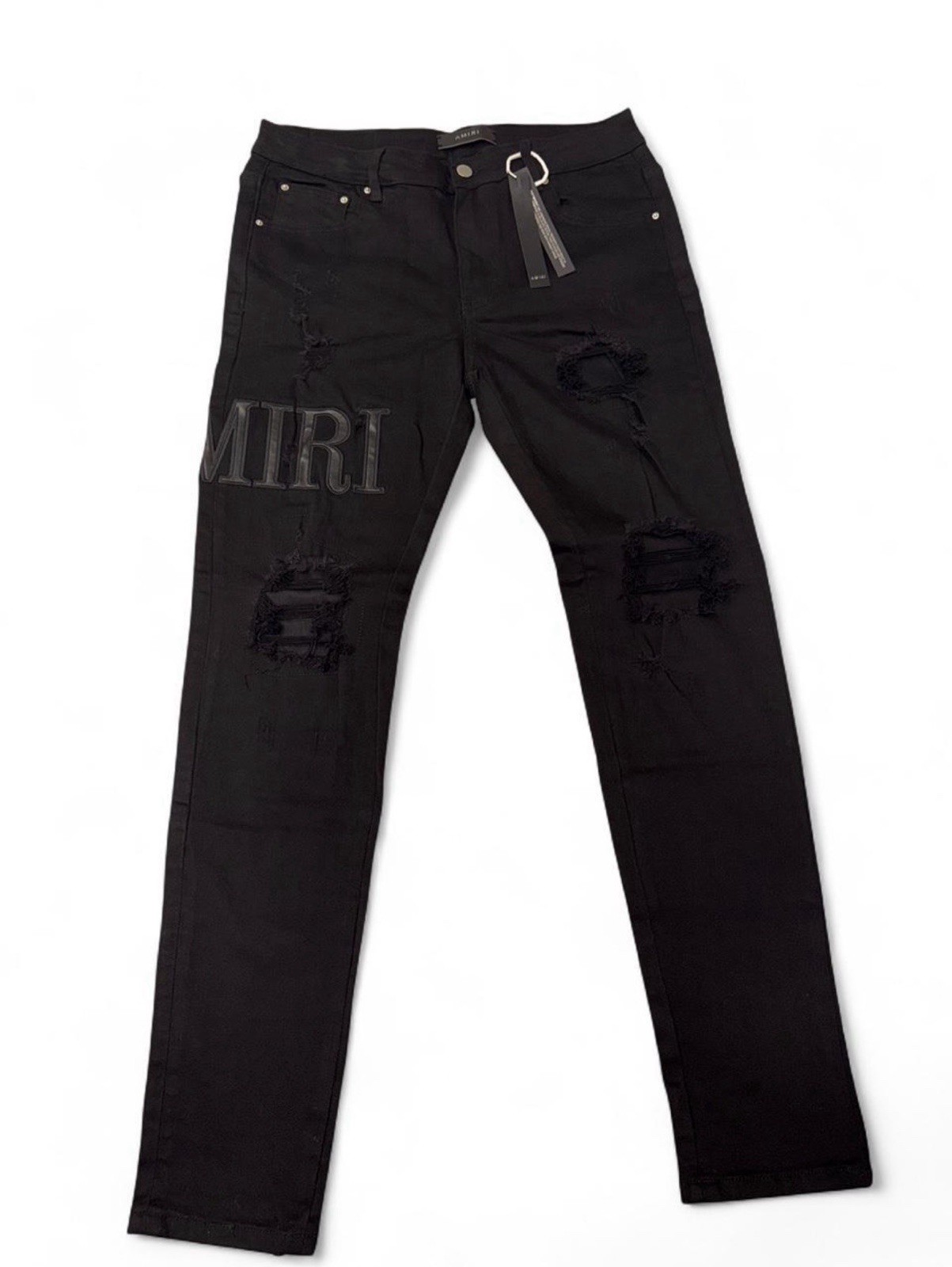 AMIRI Core Appliqué Denim Skinny Jeans (in Black)