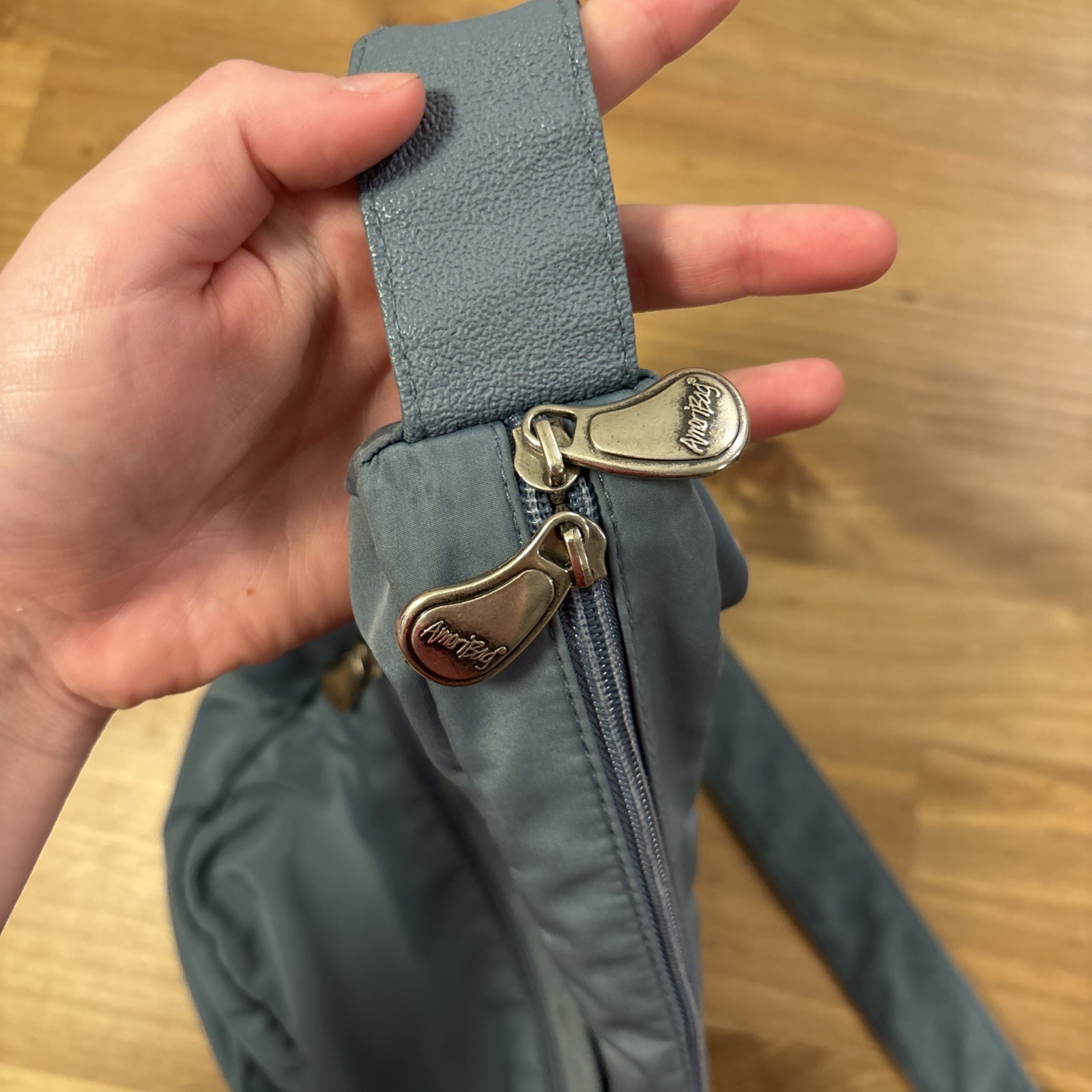 AmeriBag Healthy Back Bag Backpack Crossbody Sling Day Pack Adjustable Blue