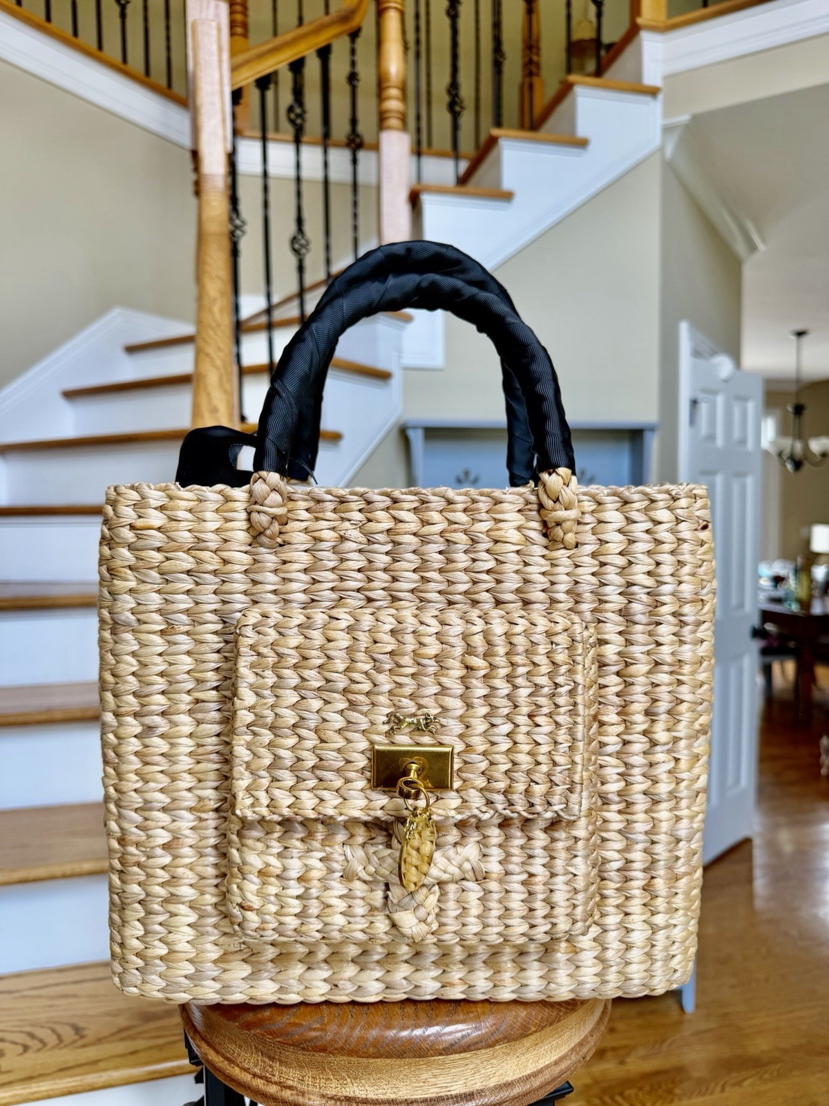 MME Mink Sissy Pocket Tote in black/noir. Woven handbag. MFSRP $450