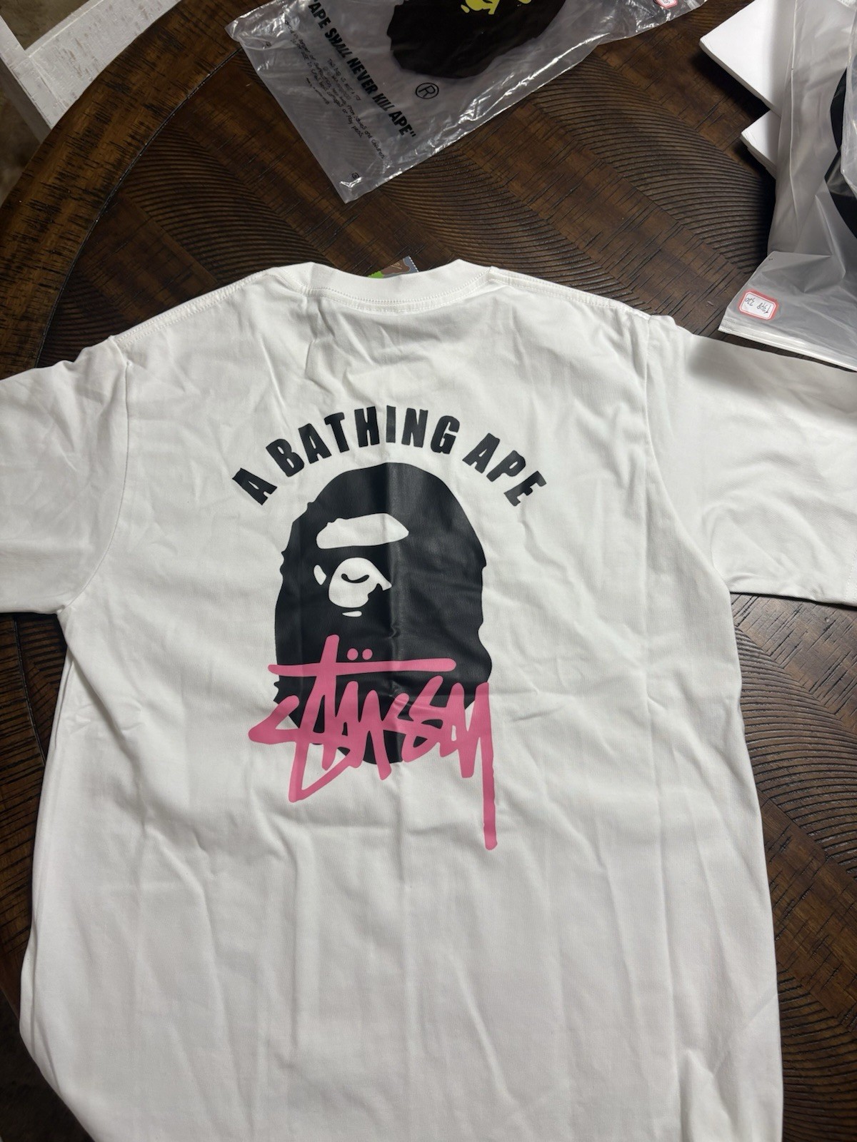 A Bathing Ape (BAPE) x Stussy Men’s L White Ape Head Graphic Tee Crew