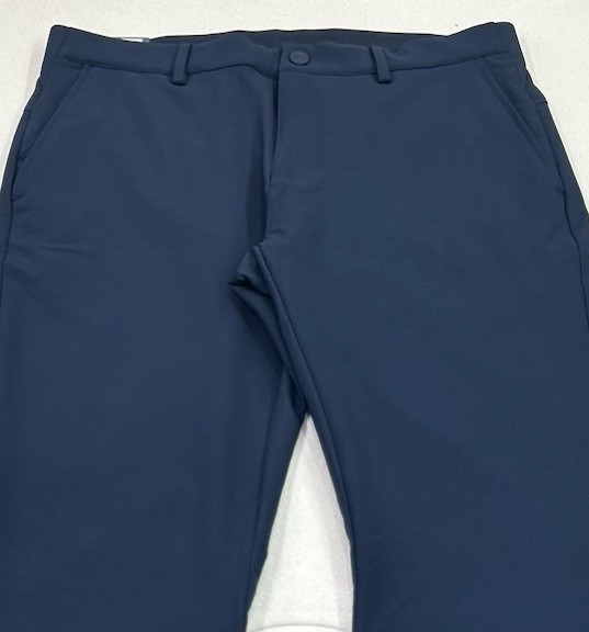 Greg Norman Men’s Performance Flex Waistband Snap Button Pants, Blue, Size 32X34