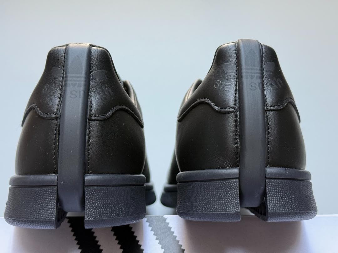 A classic split in half Collaboration Stan Smith black 10