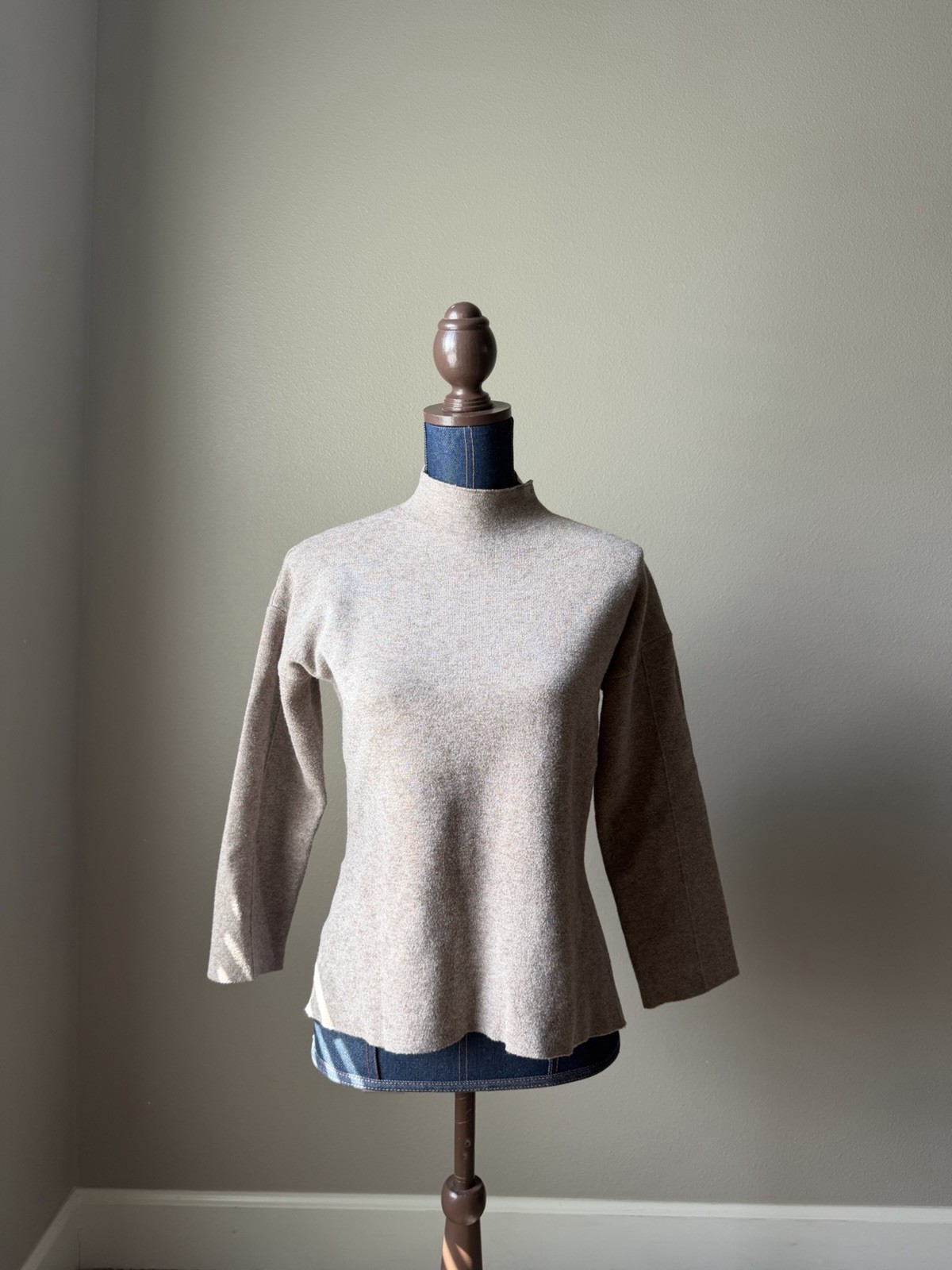 boxy sand colored mid neck sweater w/ slits on sides