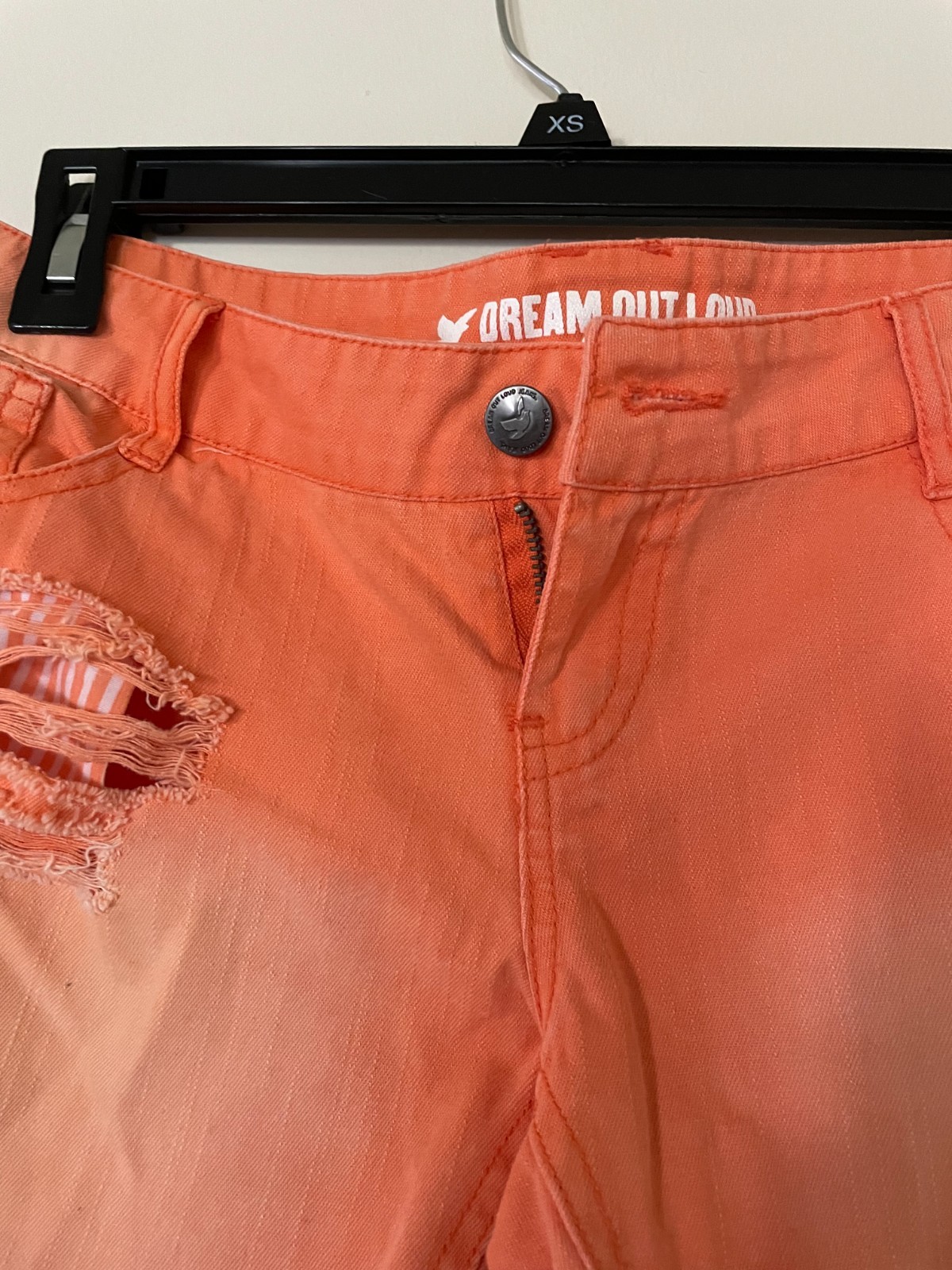 DREAM OUT LOUD distressed orange shorts by Selena Gomez