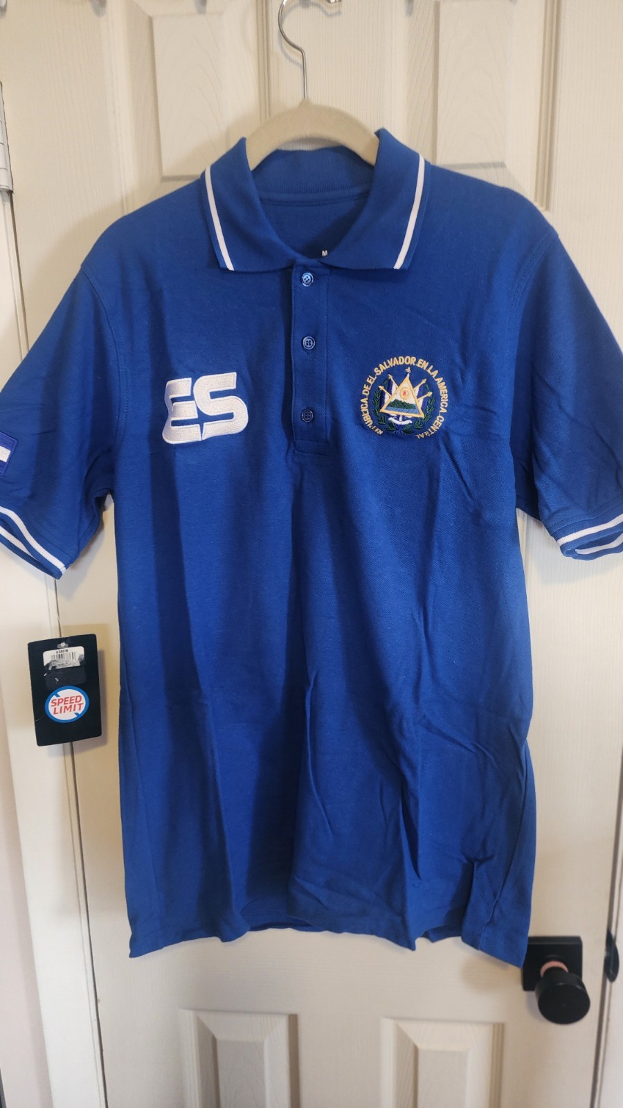 El Salvador Polo shirt blue size M embroidered logos.