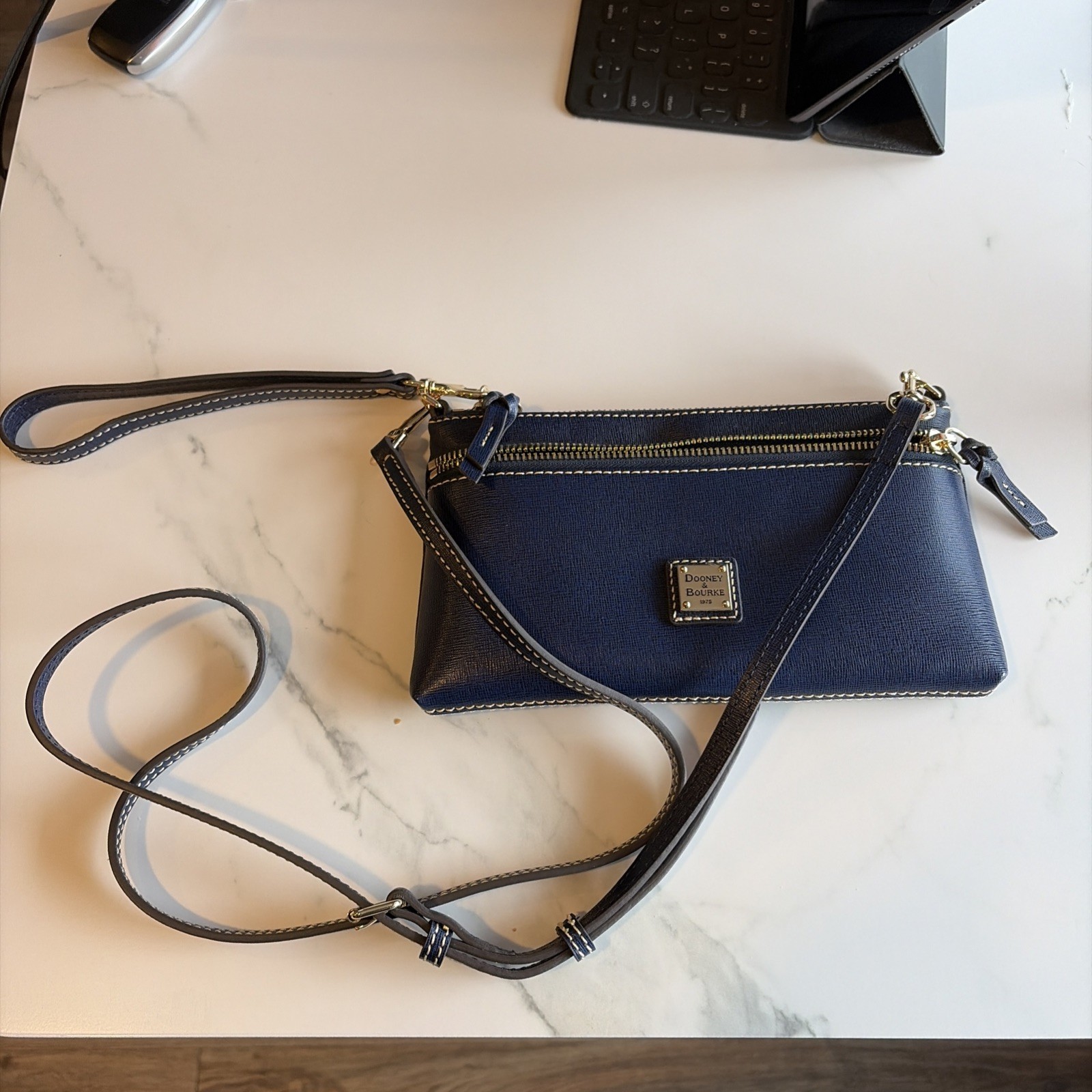 Dooney Bourke Navy Blue Crossbody Or Wristlet. Never Used 9“ X 6“ Leather.