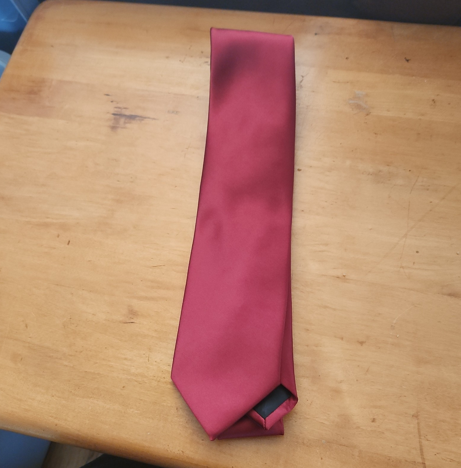 St. Nicks Tie Shop Men’s Burgundy Solid Satin Polyester Pointed Tie Logo Accent