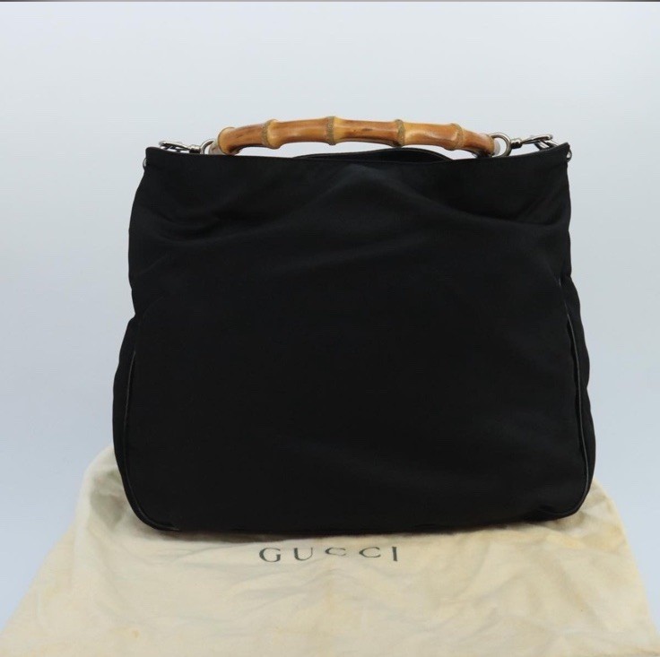 GucciBambooHandle Nylon Bag, Stain inside bag lining as pictured.Good Condition