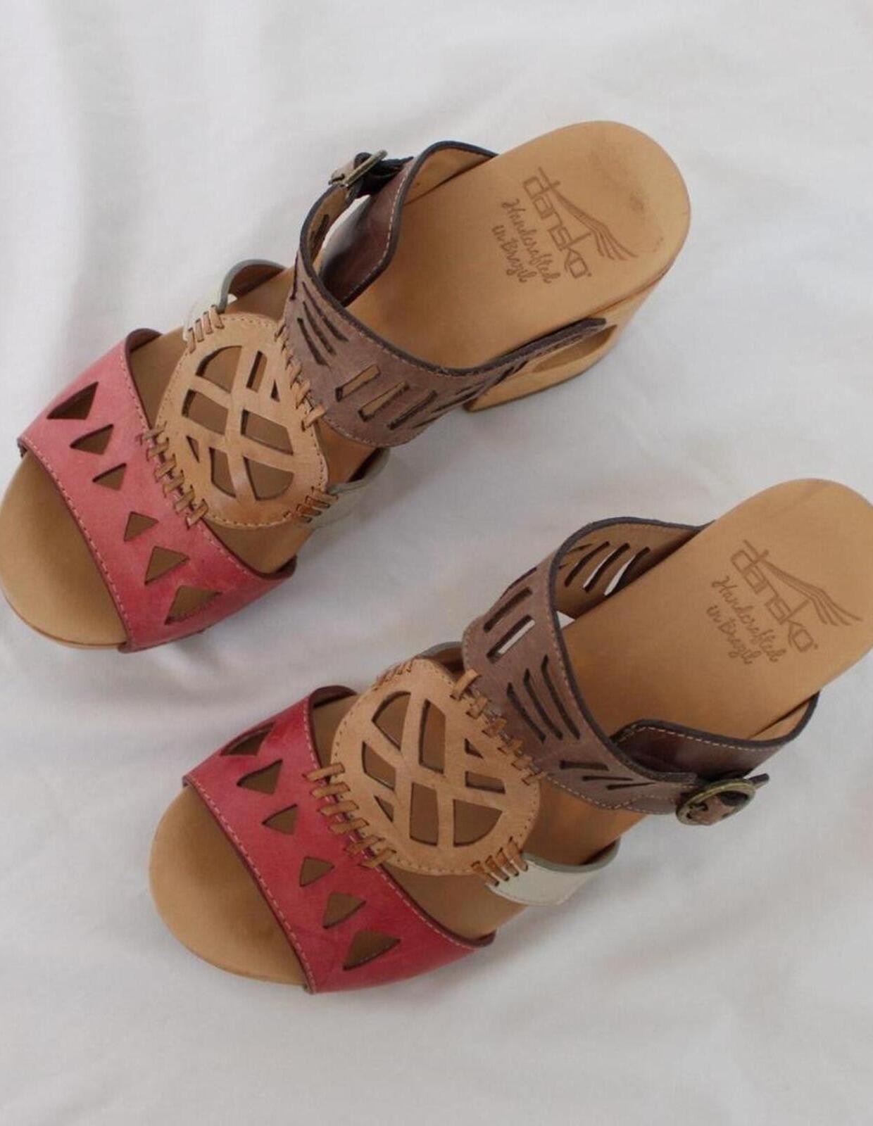 Dansko Oralee clogs with a leather upper with cut-out designs. size US 7.5-8