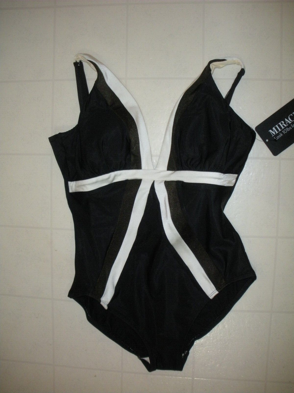MIRACLESUIT Black Specrtra Trilogy 1 PC V Neck Style Swimsuit Sz 10 NWT