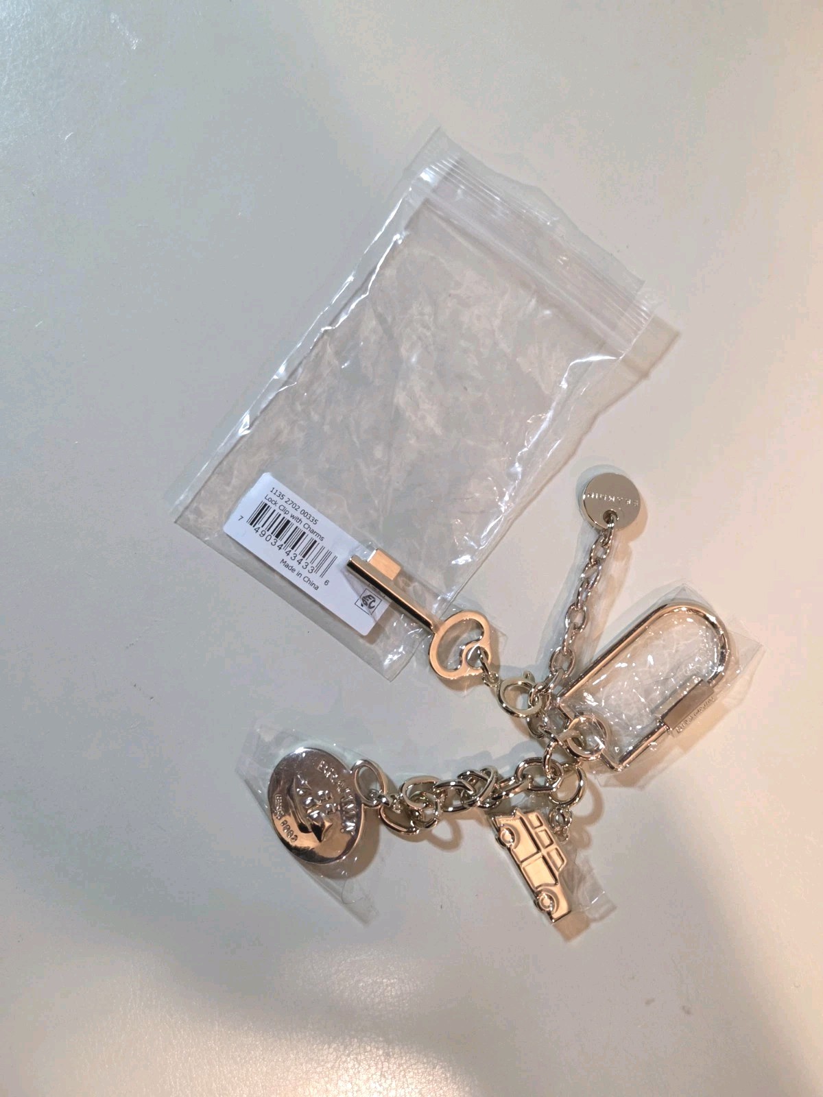 NWT Brahmin Light Gold Lock Clip Charm Key Wagon Logo Accessory Bracelet