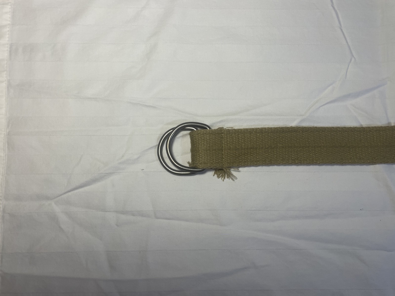 unbranded khaki/tan canvas military-style D-ring web belt