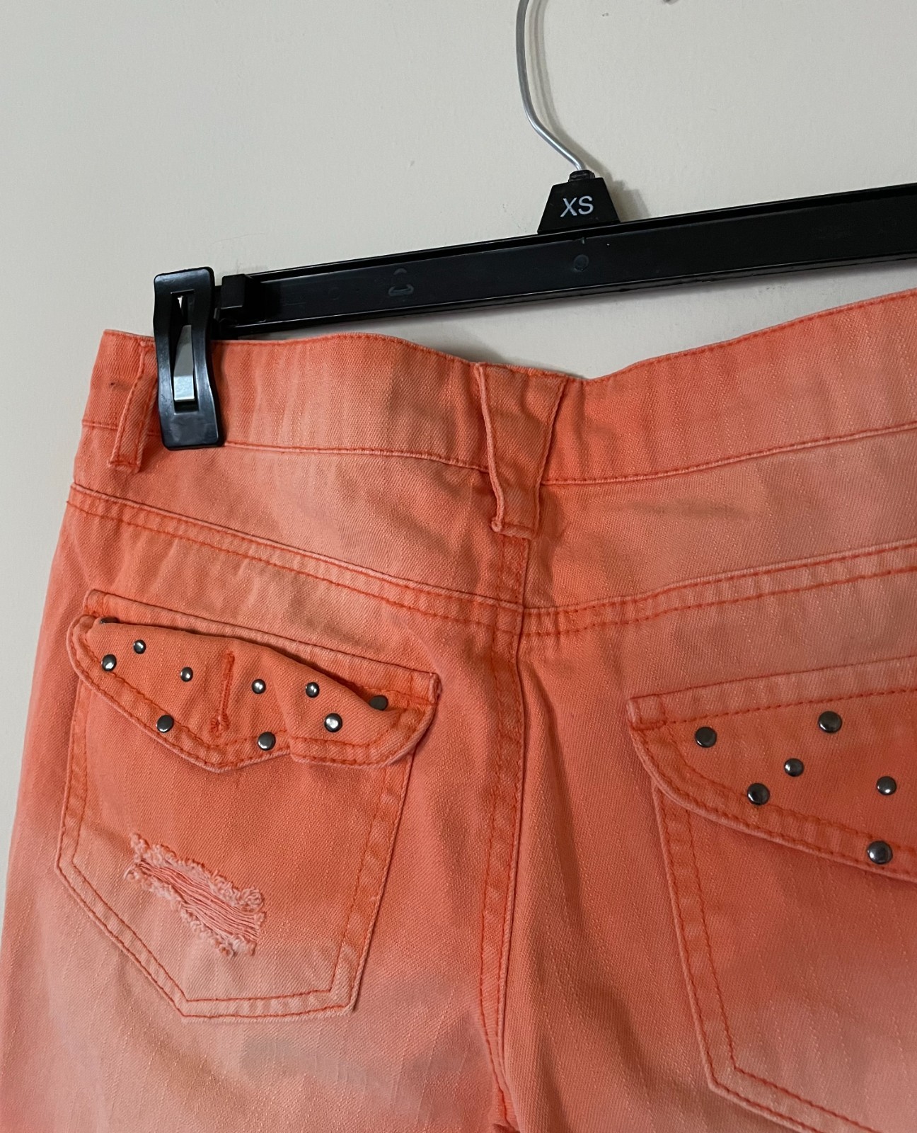 DREAM OUT LOUD distressed orange shorts by Selena Gomez