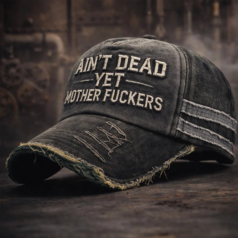 “Ain’t Dead Yet” Distressed Washed Black Baseball Cap | Embroidered Dad Hat