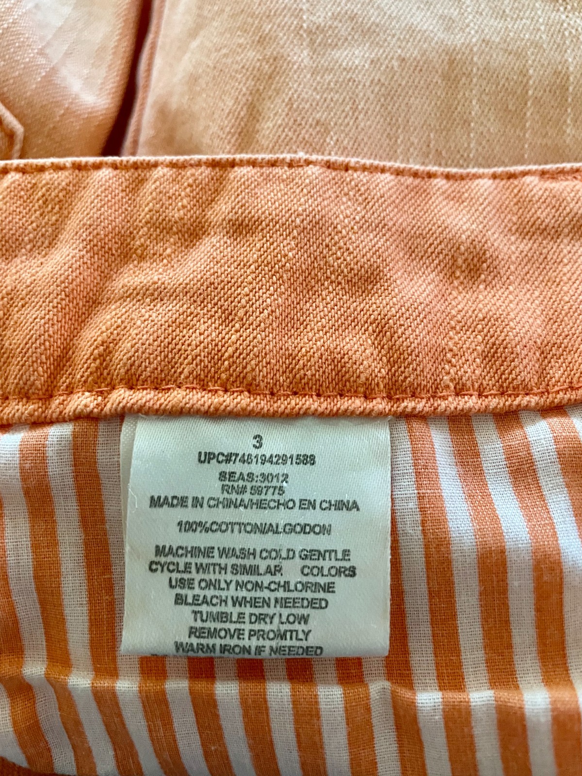 DREAM OUT LOUD distressed orange shorts by Selena Gomez