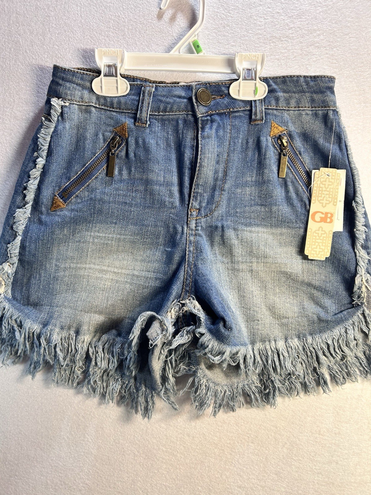 GB Women’s Blue Medium Wash Denim Cut Off Fringe Hem Zipper Pockets Size 5